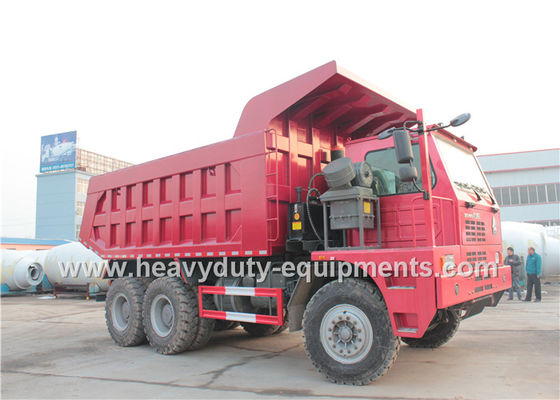 China Sinotruk howo heavy duty loading mining dump truck for big rocks in wet mining road supplier
